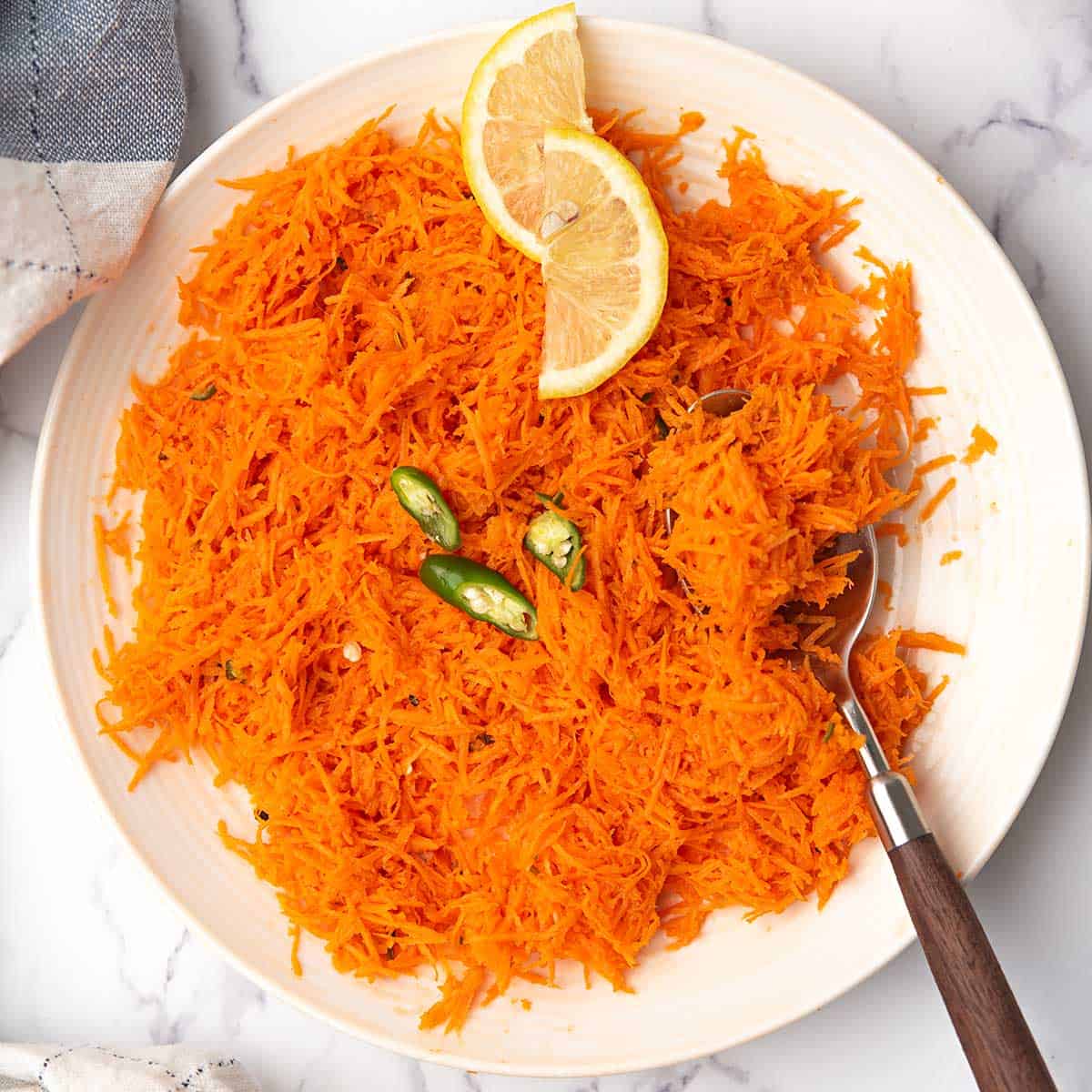 indian carrot salad served as the side dish over the dinner table.