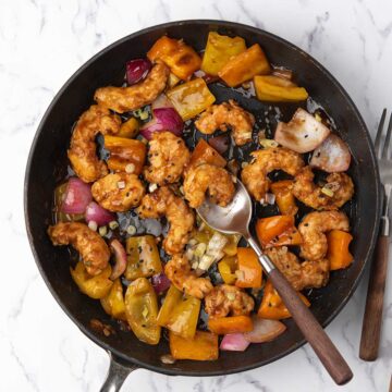 P F Changs style fire cracker shrimp, tossed with the glossy sauce and with peppers and onion.