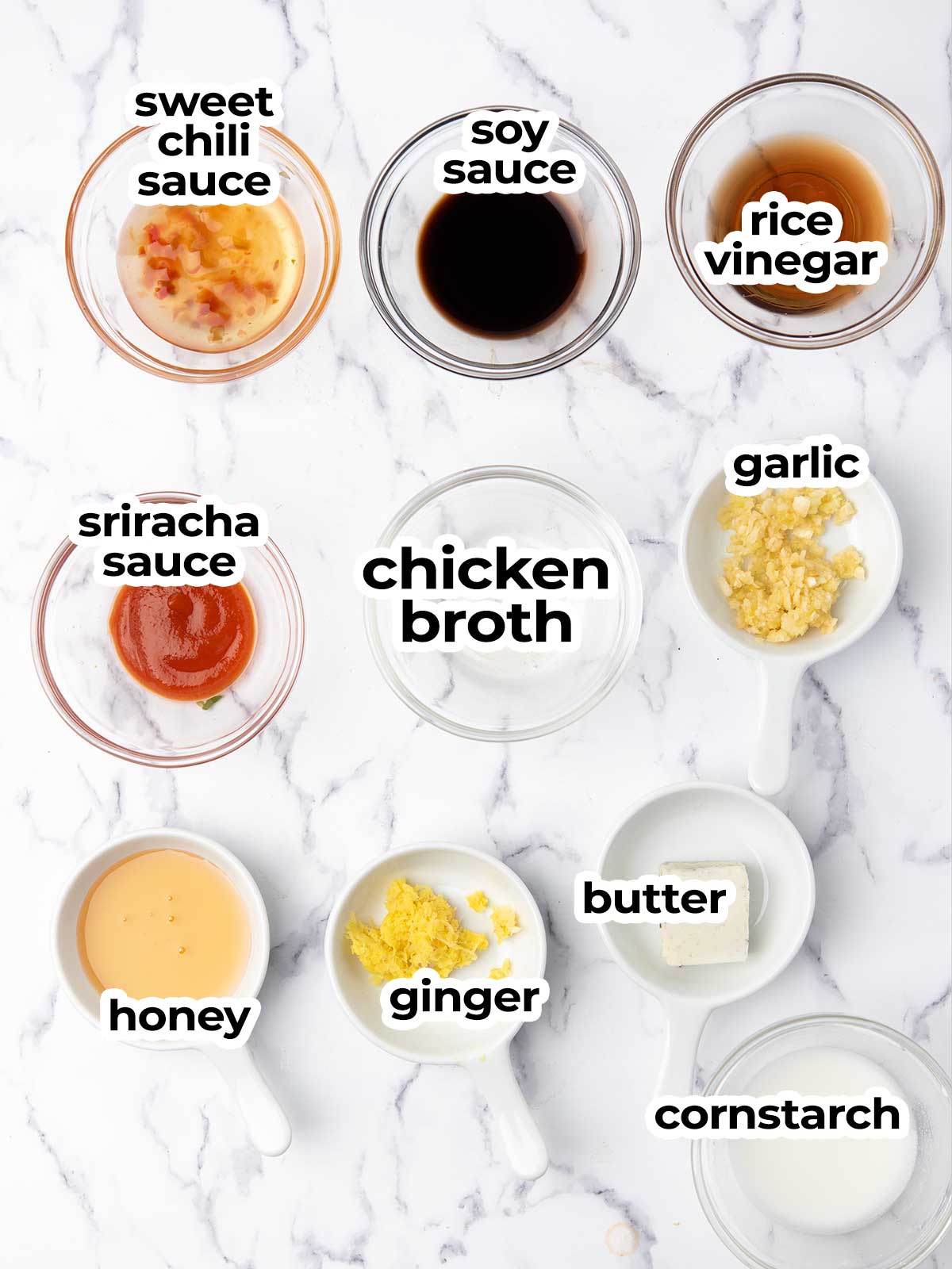 ingredients for the firecracker shrimp sauce arranged in the marble kitchen counter.