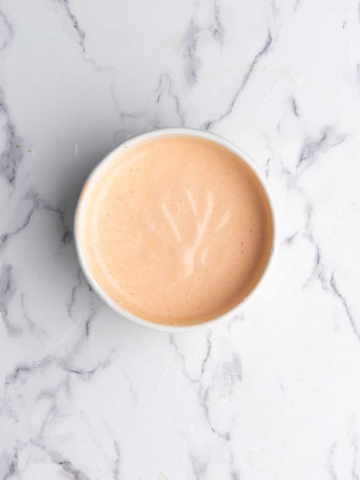 quick Sriracha mayo in the small mixing bowl.