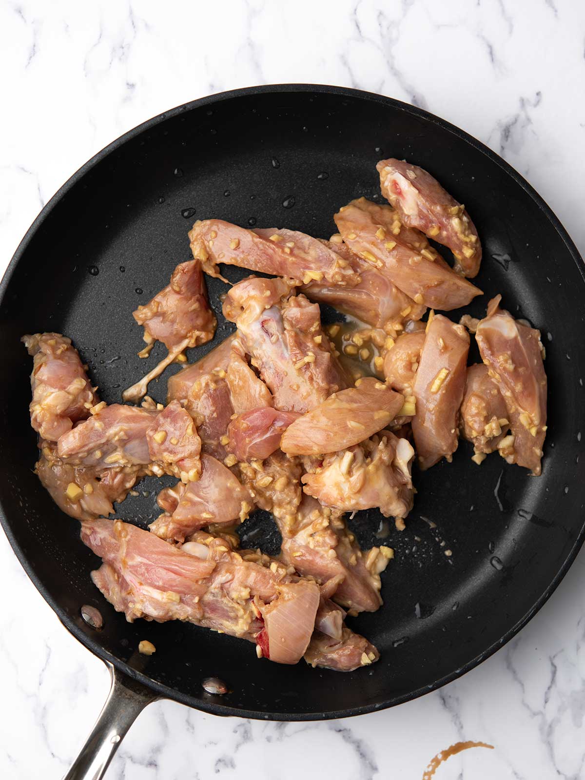 cooking the teriyaki chicken.