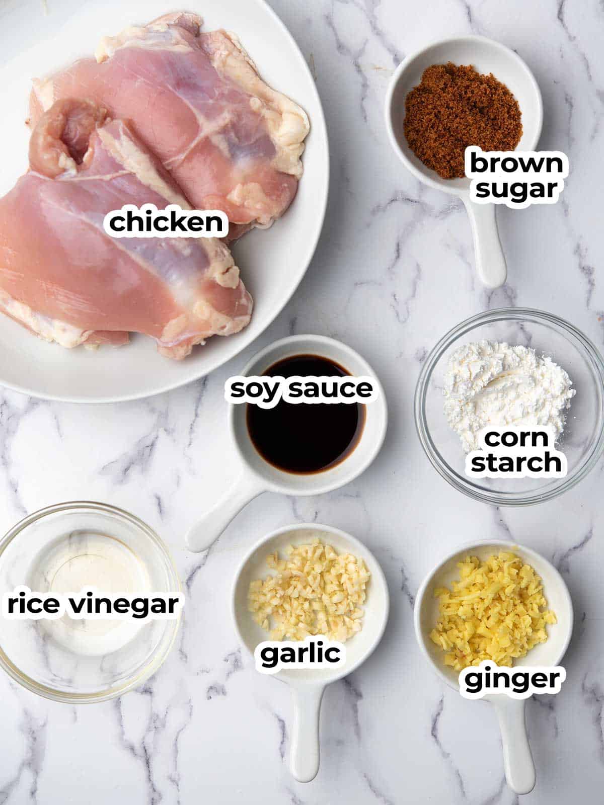 the ingredients for teiyaki chicken set up in the kitchen counter.